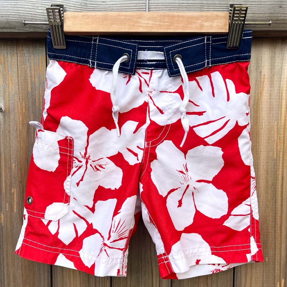 FINAL PRICE: HANNA ANDERSSON Red Swim Shorts with White Hawaiian Flower Design